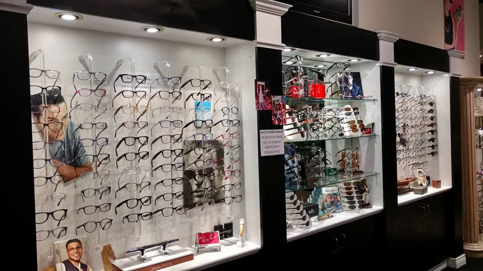 Wall of designer eyeglass frames — Ray-Ban, Fendi and more — in Pensacola